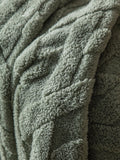 Gallery Home green cross knit throw, imported from the UK