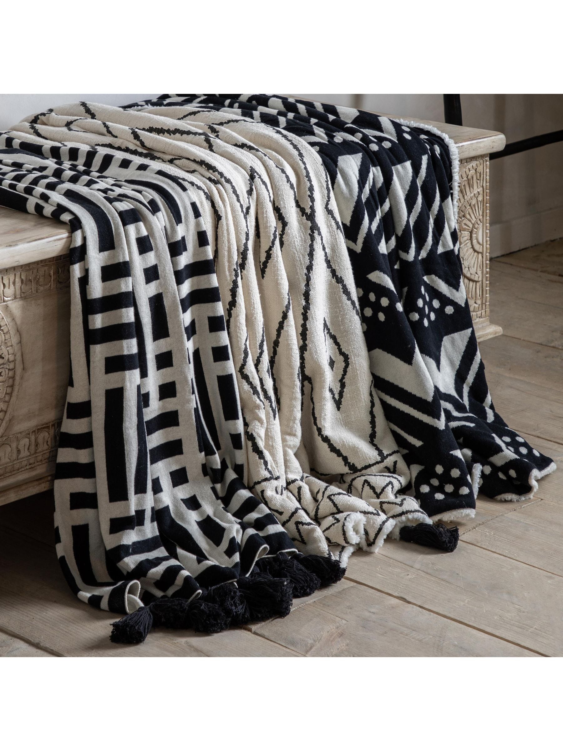 Gallery Home black knitted tassel throw, 200cm by 130cm (British brand)