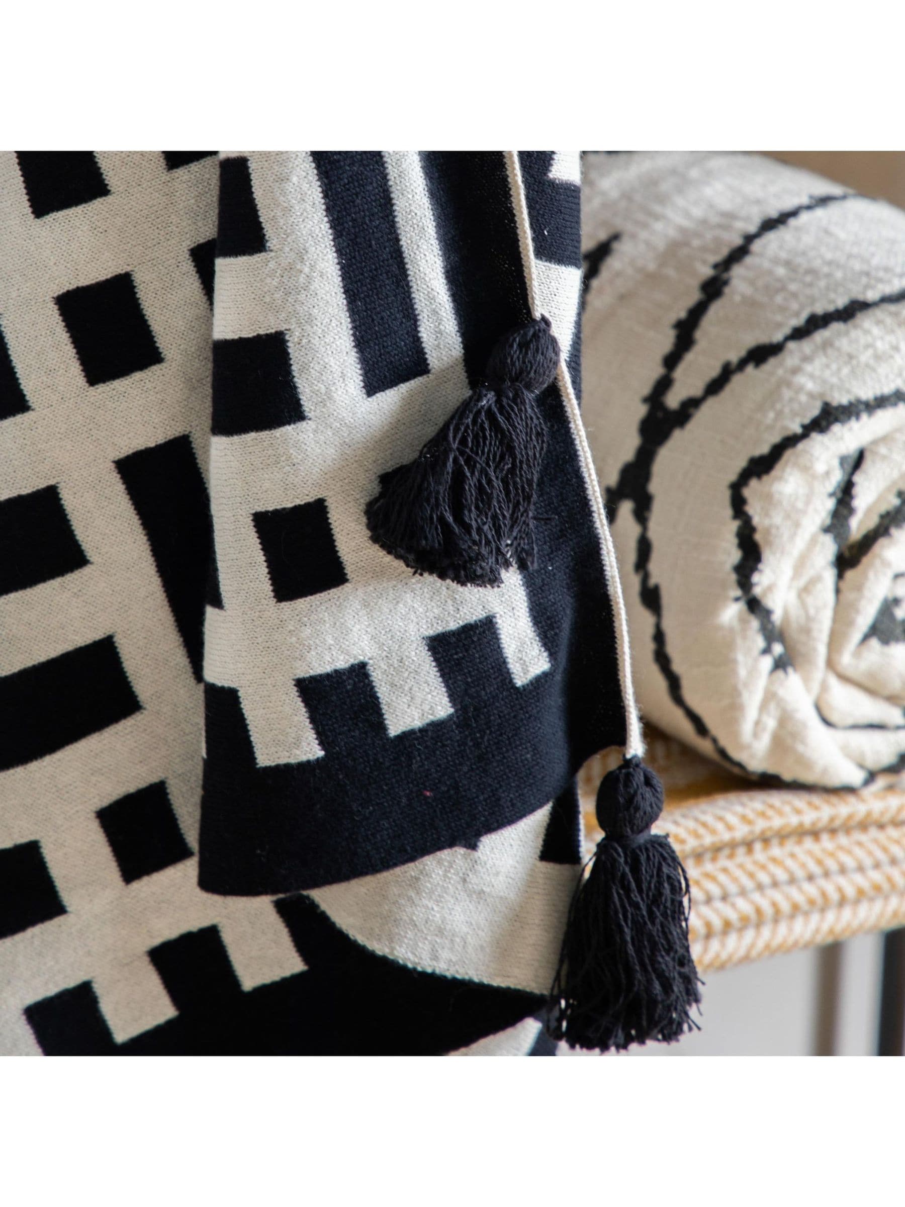 Gallery Home black knitted tassel throw, 200cm by 130cm (British brand)