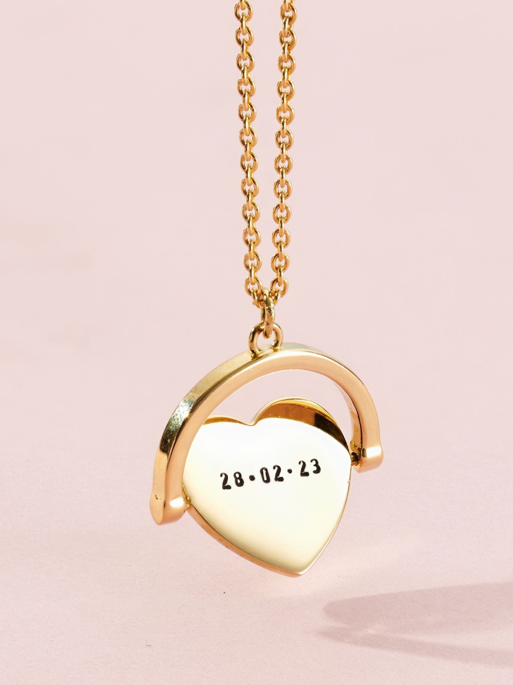 Posh Totty Designs gold tone heart spinner necklace, UK version