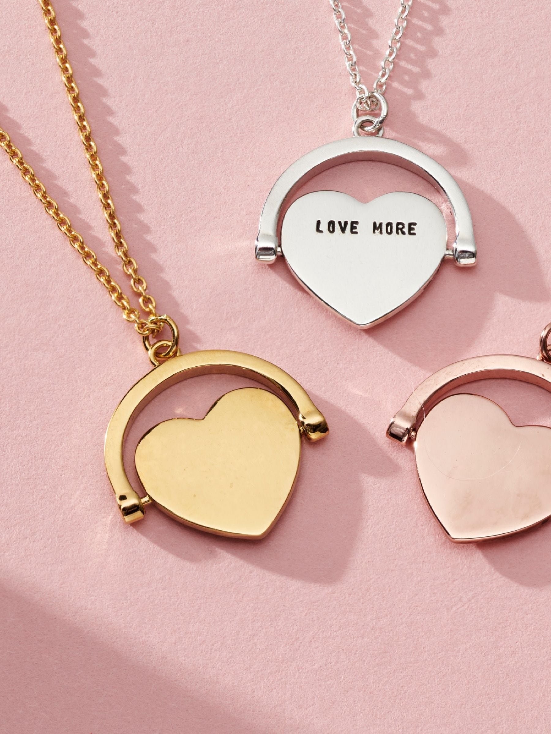 Posh Totty Designs gold tone heart spinner necklace, UK version