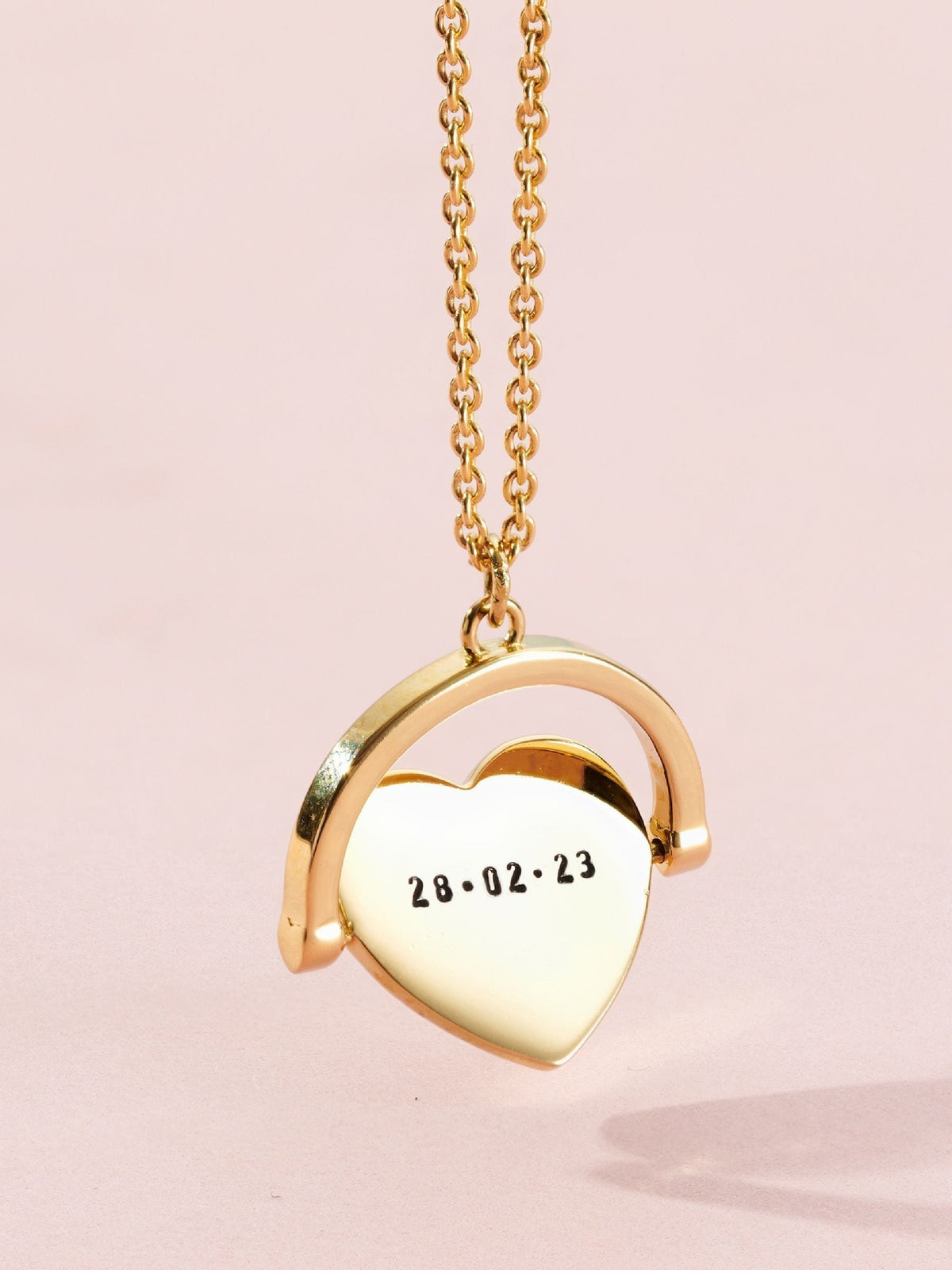 Posh Totty Designs gold tone heart spinner necklace, UK version