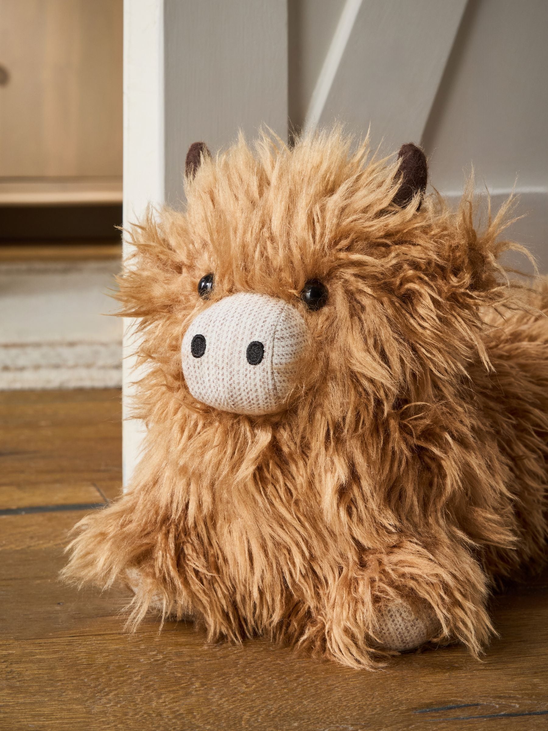 Hamish the Highland Cow draught excluder, imported from the UK