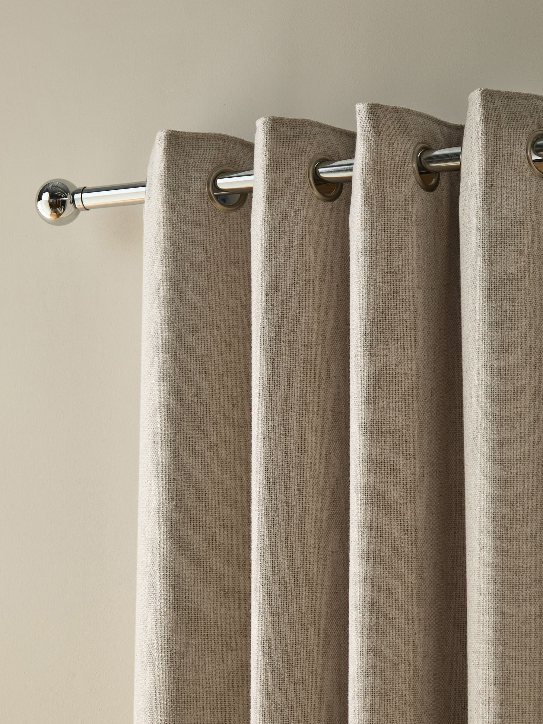 Thermal blackout eyelet curtains in natural linen blend, imported from the UK