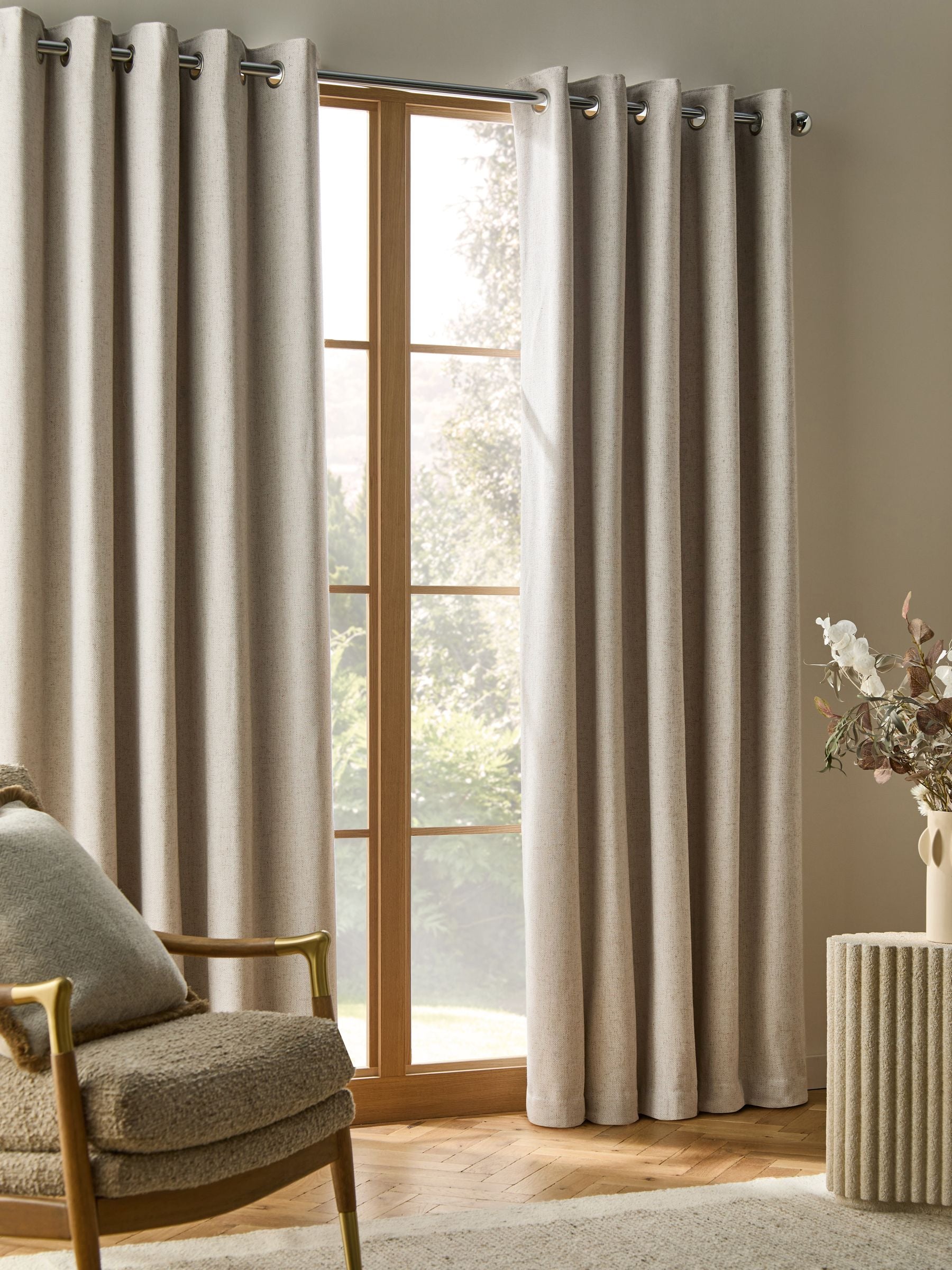 Thermal blackout eyelet curtains in natural linen blend, imported from the UK