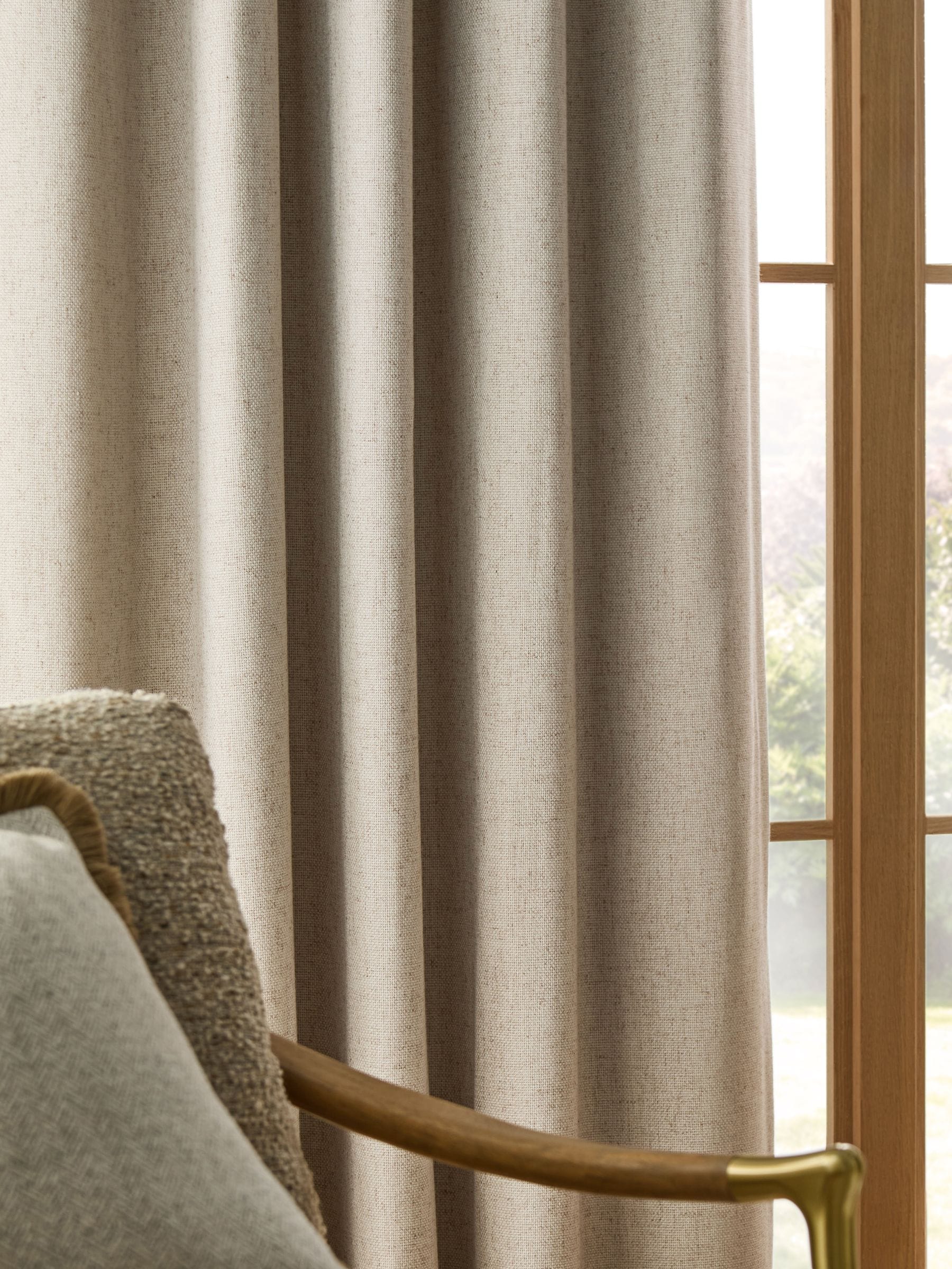 Thermal blackout eyelet curtains in natural linen blend, imported from the UK