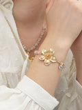 Bibi Bijoux gold tone flower bead friendship bracelet 23cm - British product