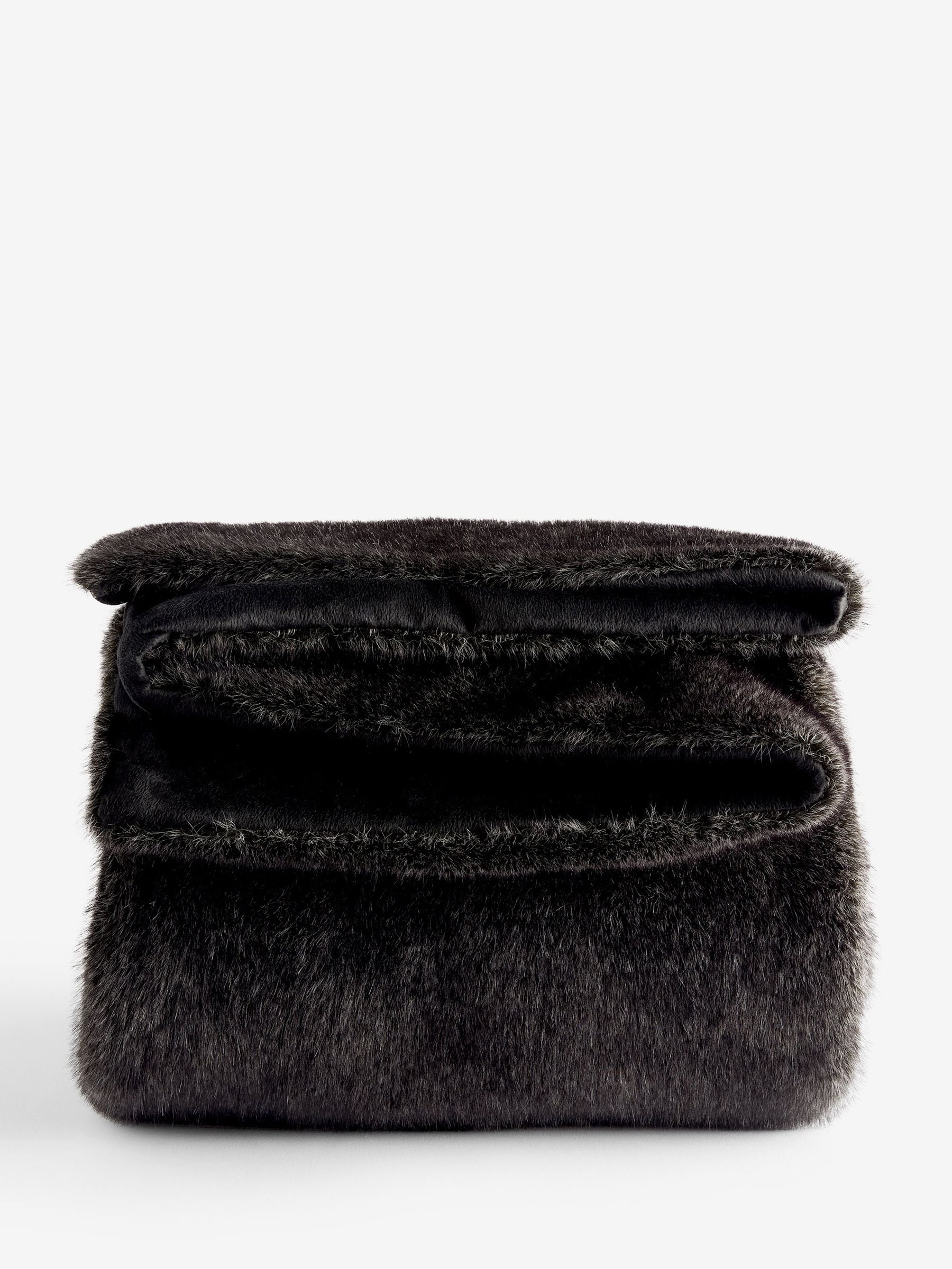 Rockett St George black luxe faux fur slogan throw British brand