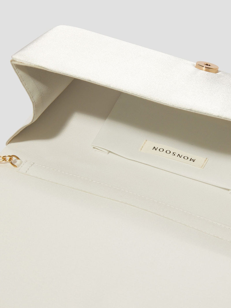 Monsoon Talia twisted satin clutch bag, imported from the UK