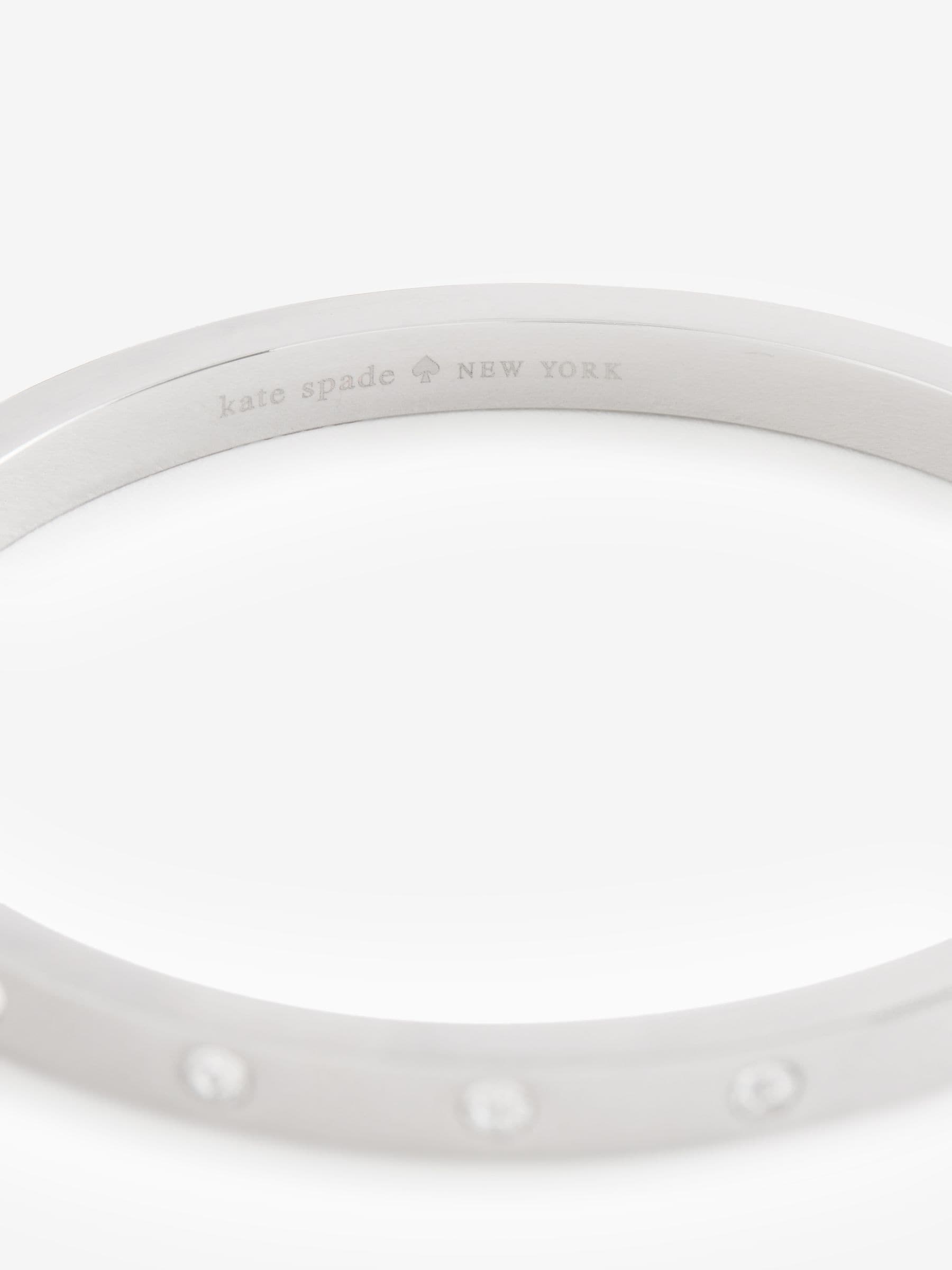 Kate Spade silver set in stone hinged bangle (British brand)
