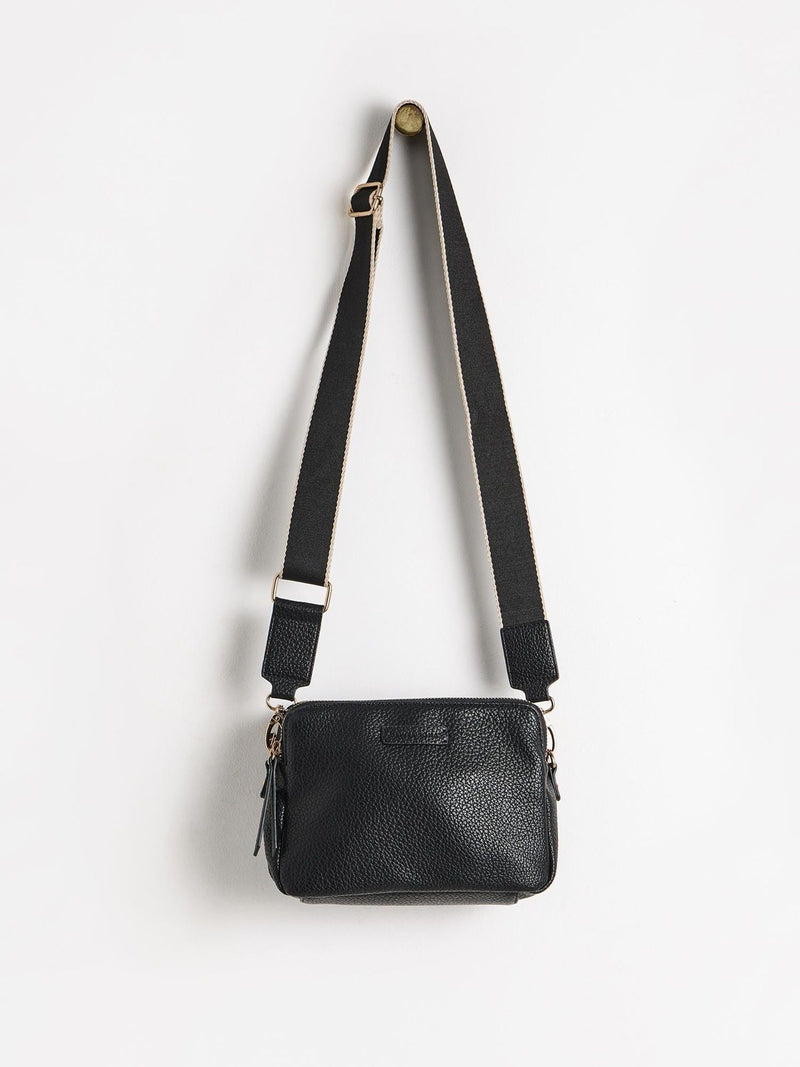 Oliver Bonas black Laura slim cross-body bag, imported from the UK