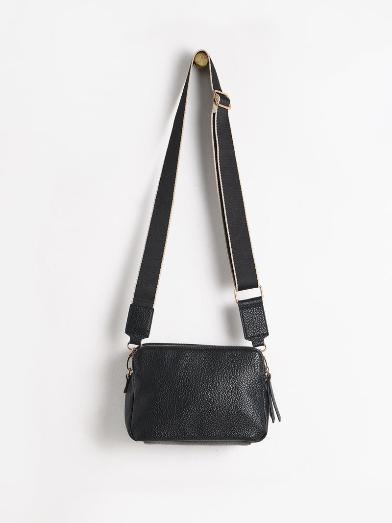 Oliver Bonas black Laura slim cross-body bag, imported from the UK
