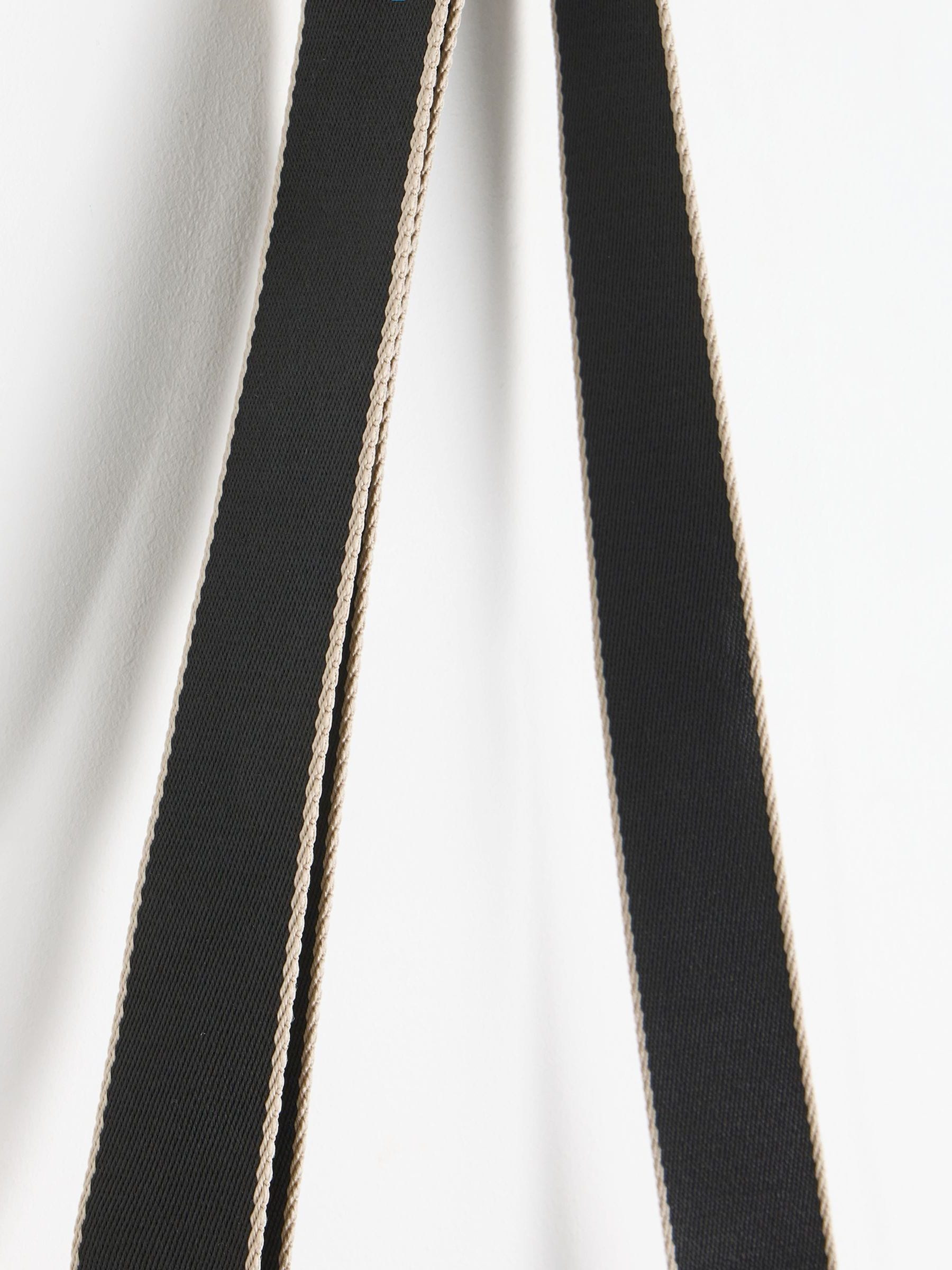 Oliver Bonas black Laura slim cross-body bag, imported from the UK
