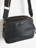 Oliver Bonas black Laura slim cross-body bag, imported from the UK
