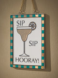 Gold ceramic Sip Sip Hooray hanging decoration (British brand)