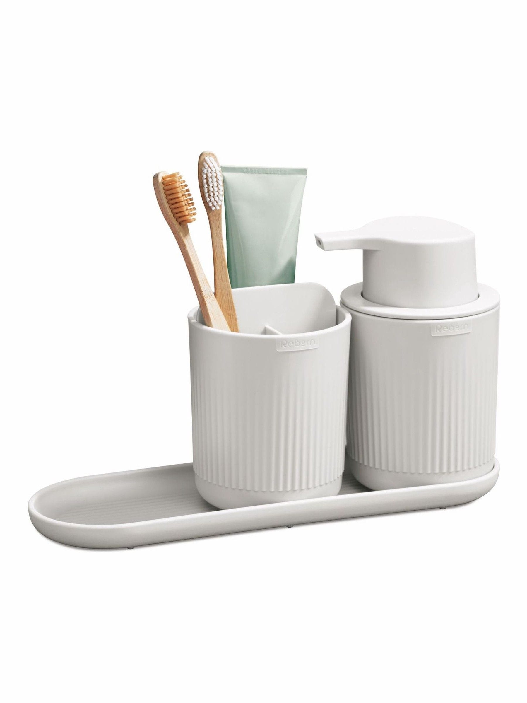ReBorn stone toilet brush and soap dispenser on tray, imported from the UK