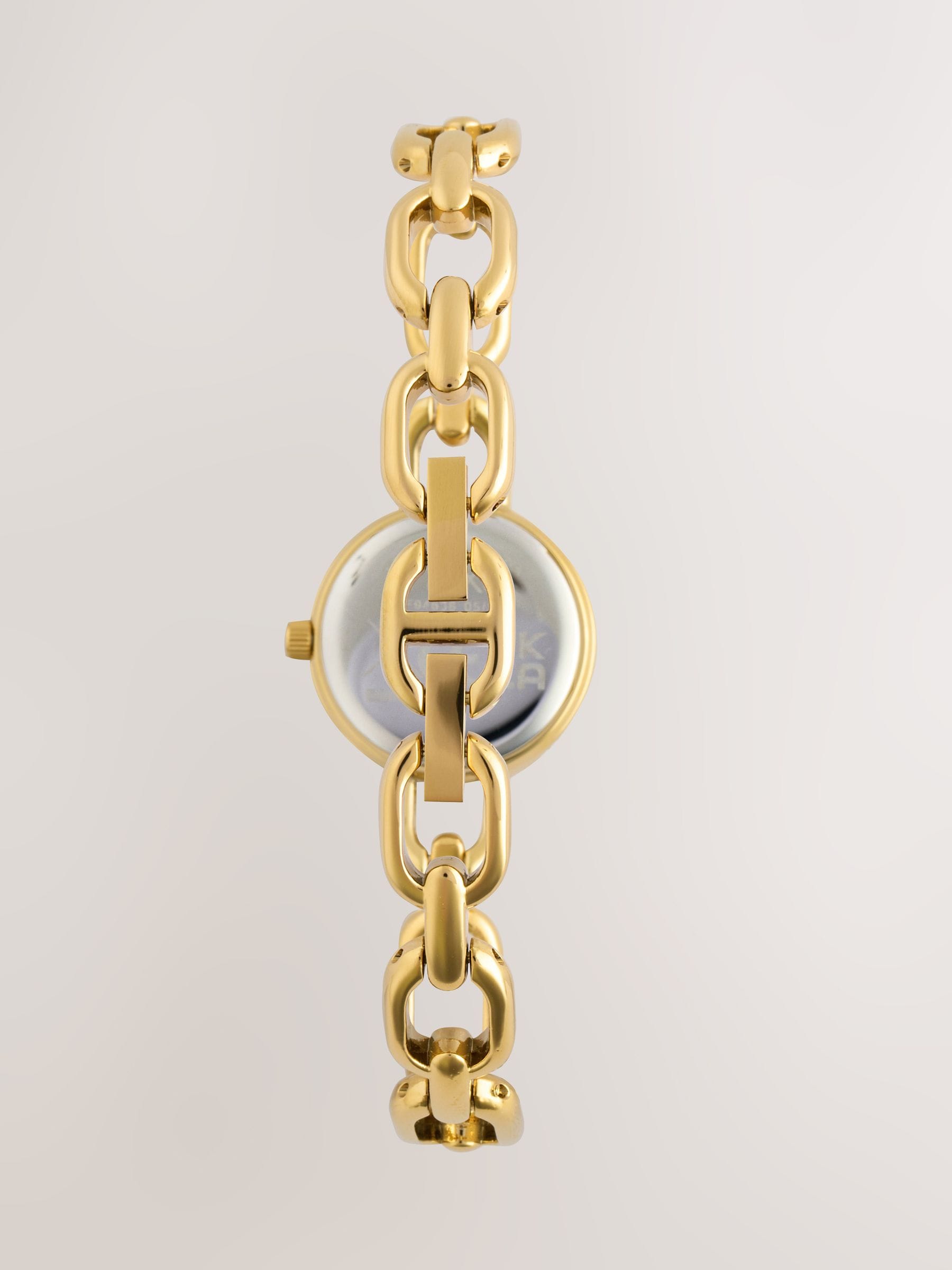 Gold tone round dial bracelet watch, imported from the UK