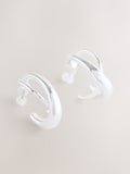 Silver tone crossover hoop earrings (British brand)