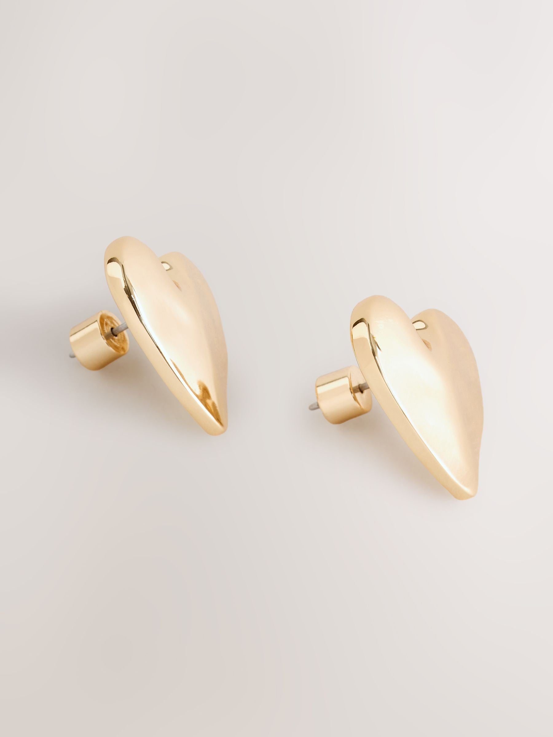 Gold tone heart stud earrings, UK version