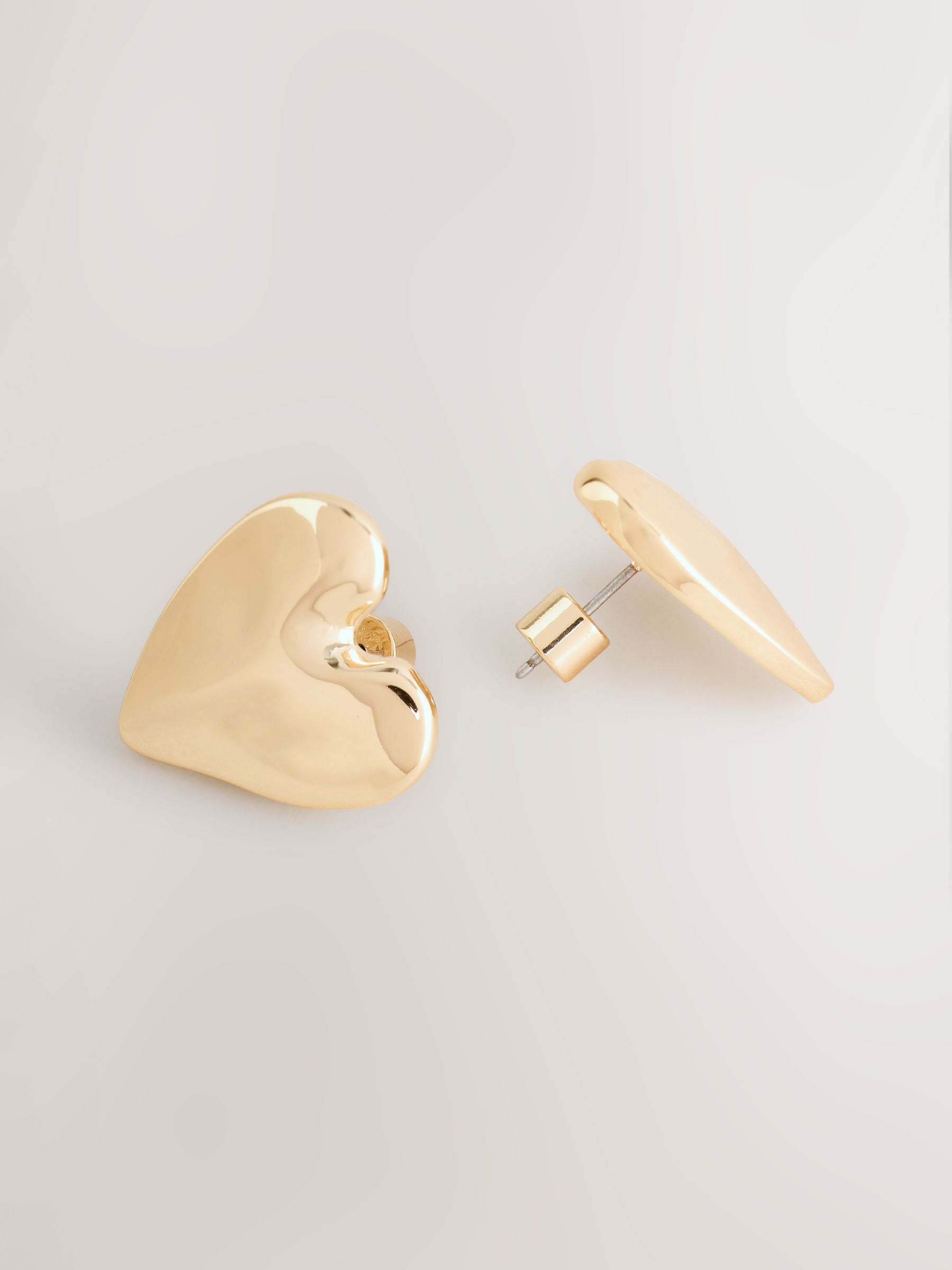 Gold tone heart stud earrings, UK version