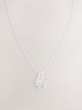 Silver tone interlocking circle pendant necklace, UK version