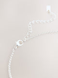 Silver tone interlocking circle pendant necklace, UK version