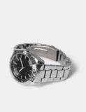 Faceted bezel steel black dial watch, UK version