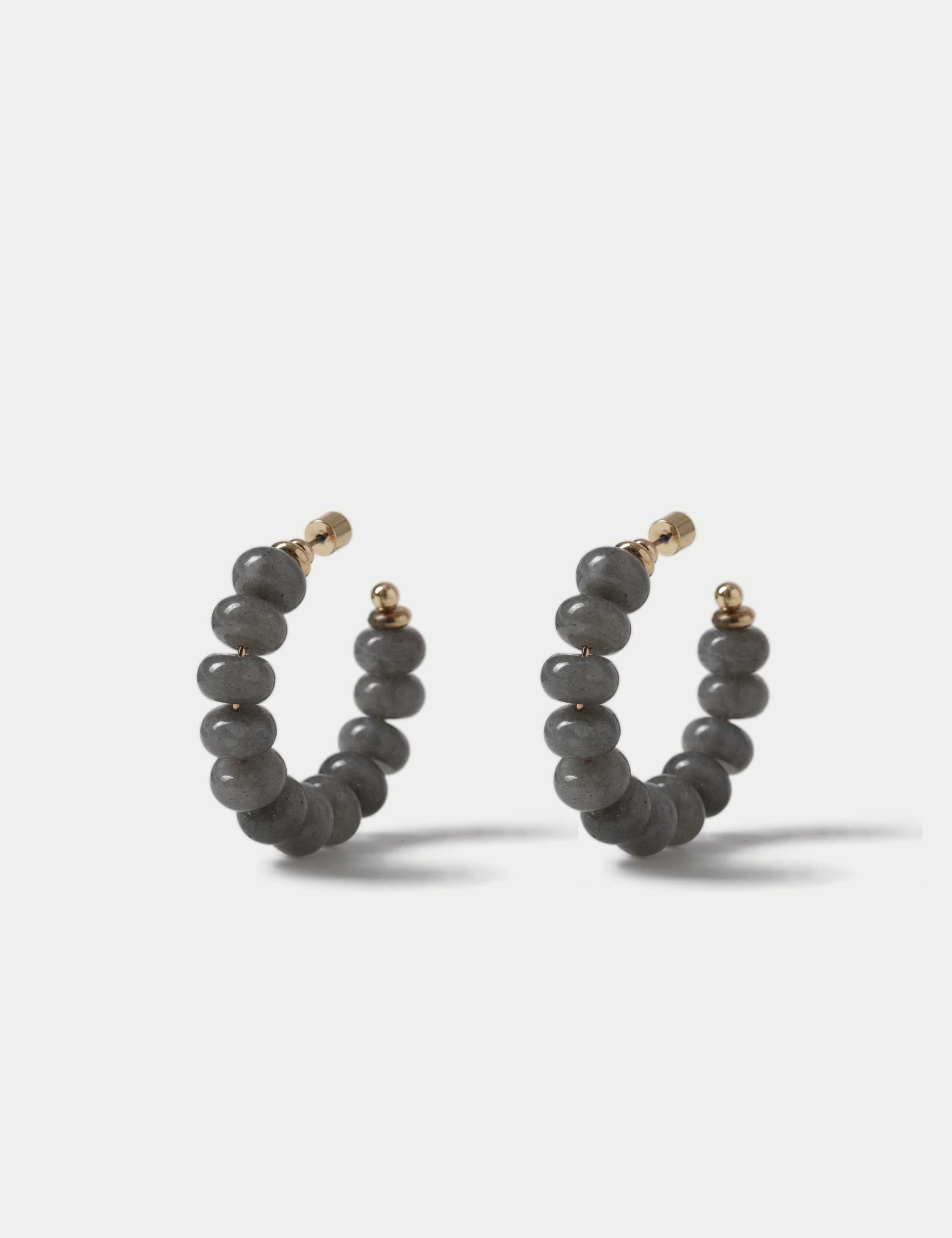 Faceted natural stone hoop earrings with iron accents, imported from the UK