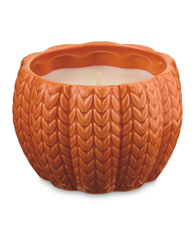 Pumpkin-shaped candle in white or orange, imported from the UK