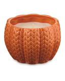 Pumpkin-shaped candle in white or orange, imported from the UK