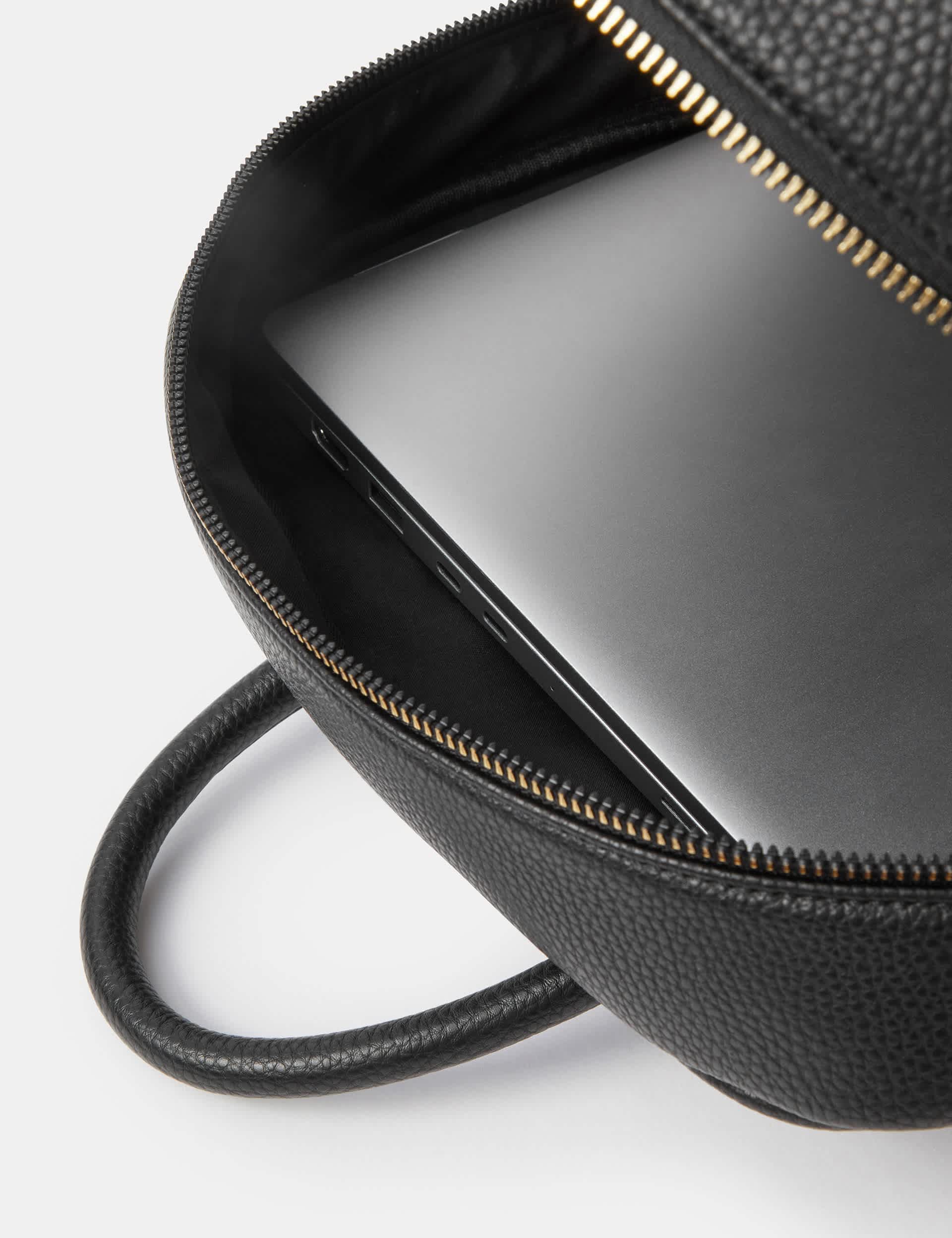 Accessorize faux leather backpack with polyurethane finish, imported from the UK