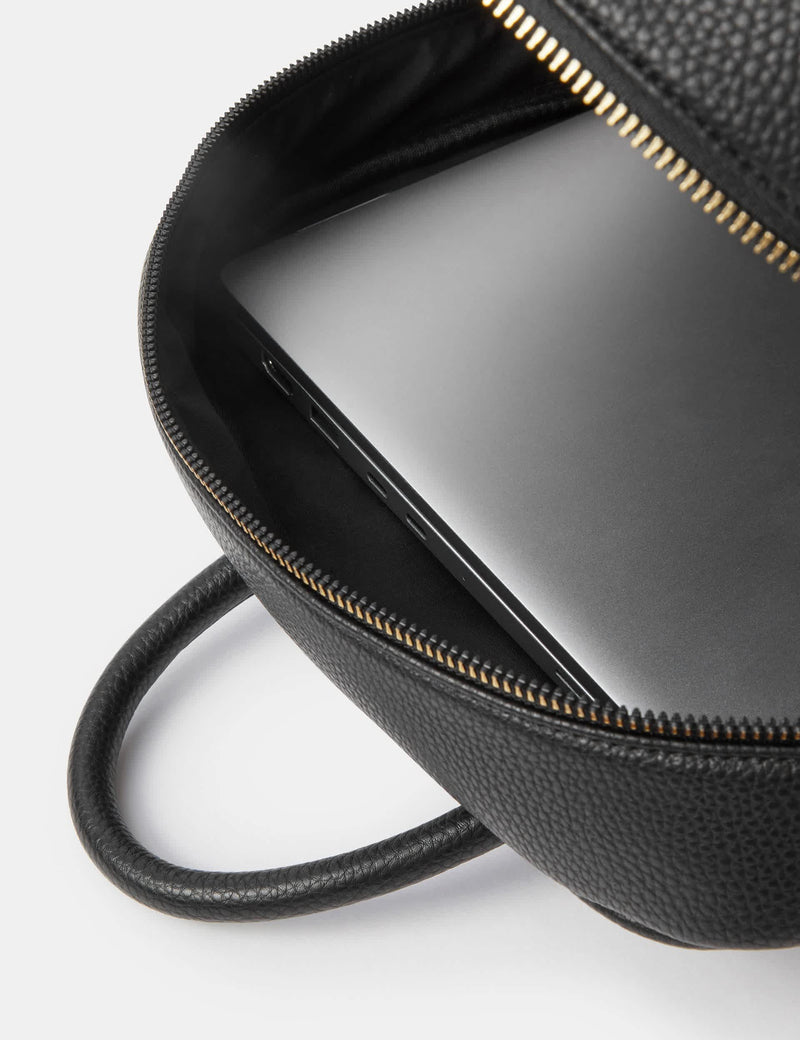 Accessorize faux leather backpack with polyurethane finish, imported from the UK