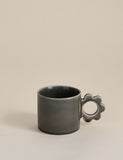 Stoneware mug with a flower-shaped handle - British product