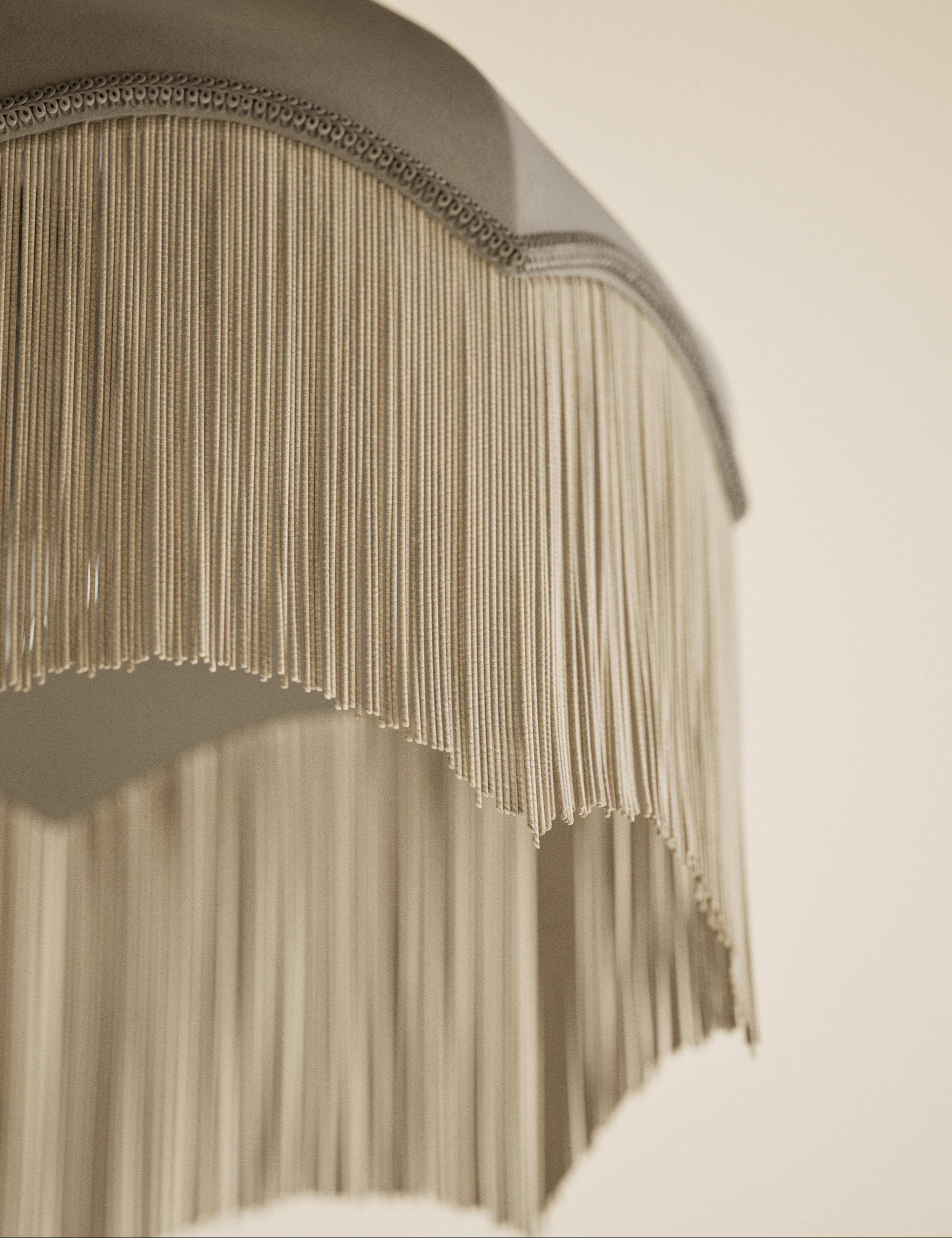 Fringed velvet lamp shade with braided tassel trim, imported from the UK