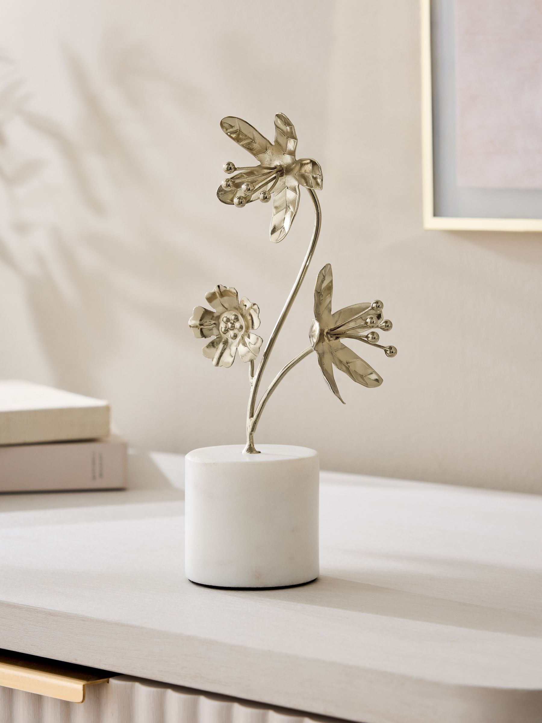 Gold flower ornament on marble base, imported from the UK