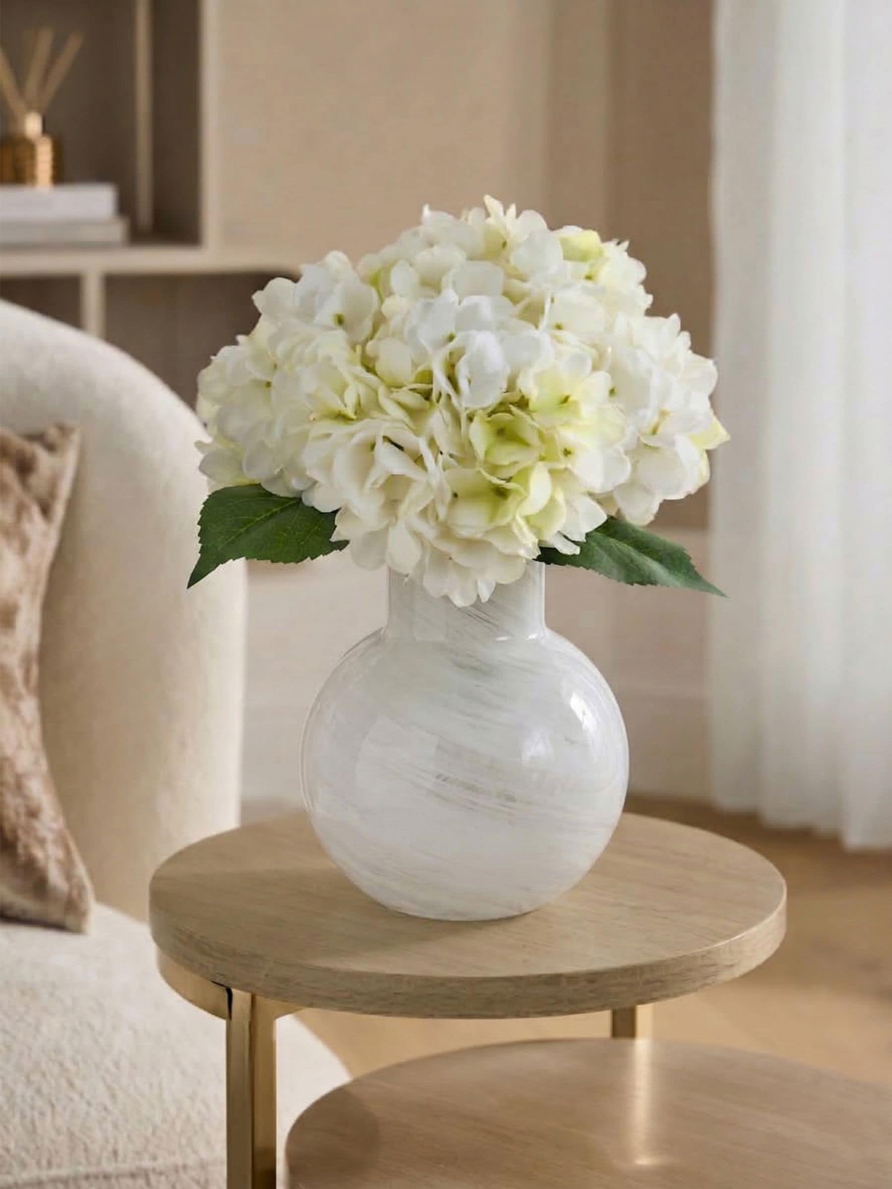 White artificial hydrangea arrangement in swirl glass vase - British product