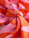 Pink orange abstract print multiway scarf sarong from a British brand