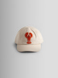 JoJo Maman Bébé ecru lobster bouclé cap, imported from the UK