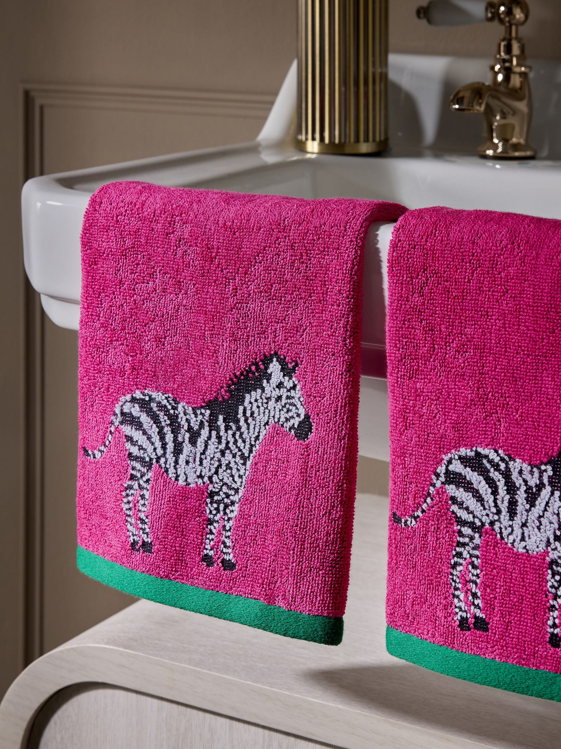 Set of 2 pink zebra cotton face cloths, UK version