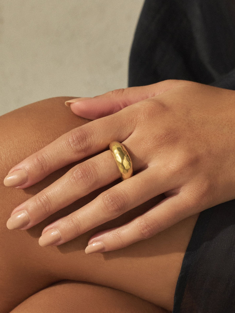 Gold tone stainless steel waterproof domed ring, imported from the UK