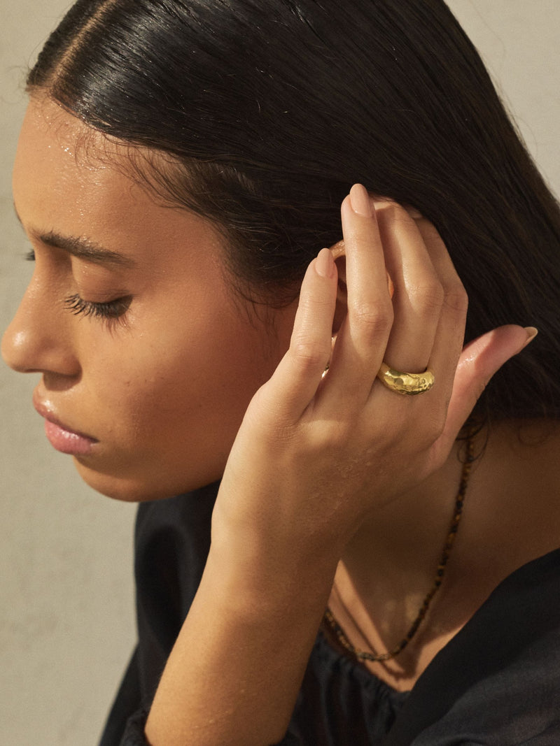 Gold tone stainless steel waterproof domed ring, imported from the UK