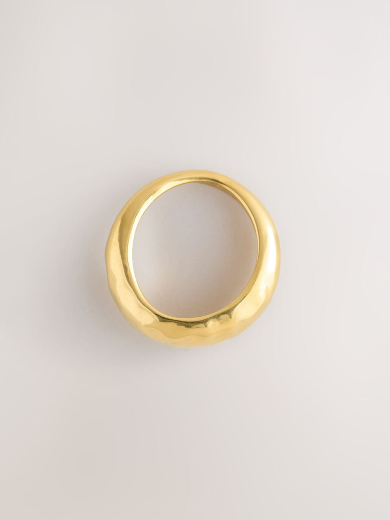 Gold tone stainless steel waterproof domed ring, imported from the UK