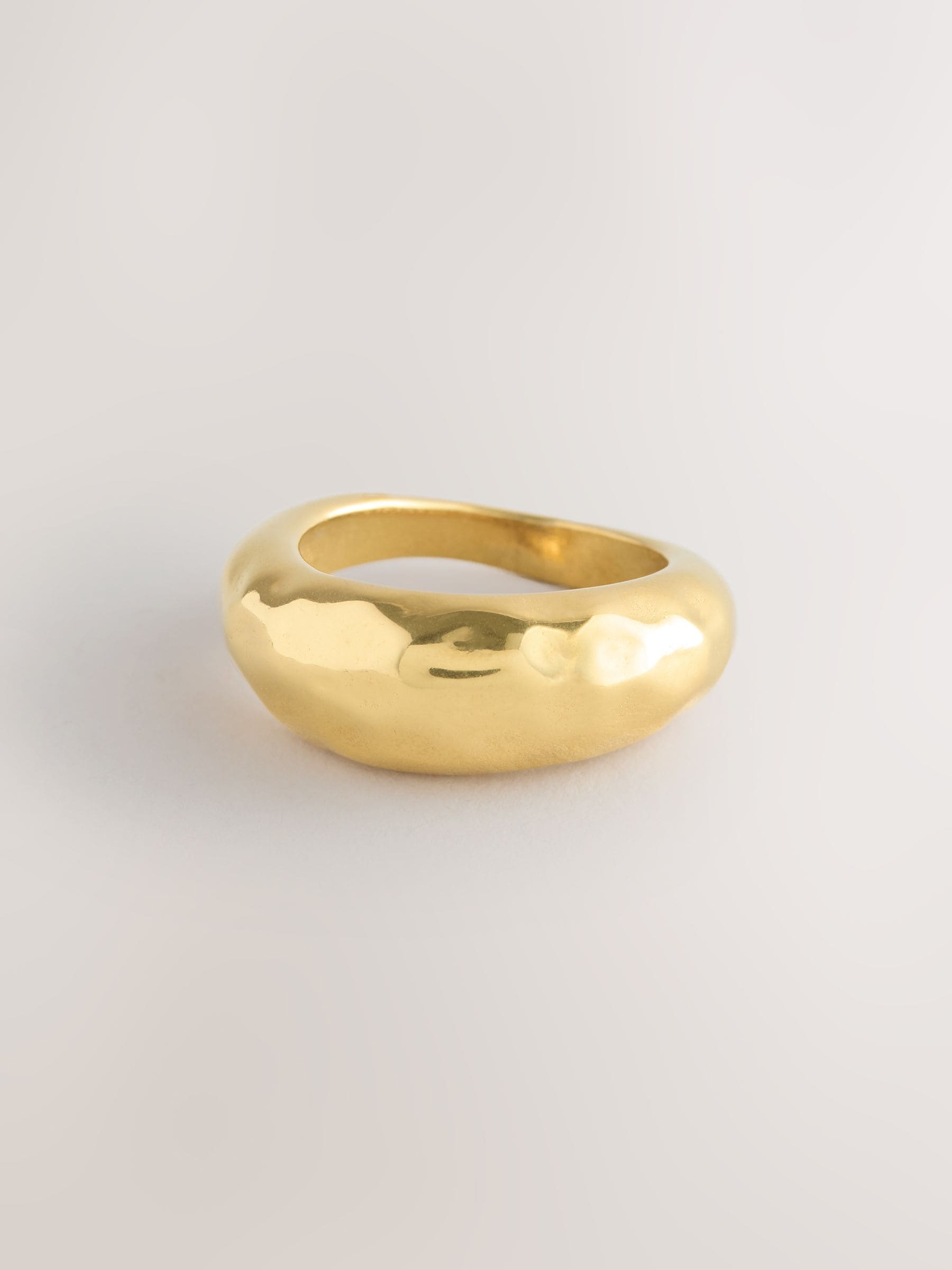 Gold tone stainless steel waterproof domed ring, imported from the UK