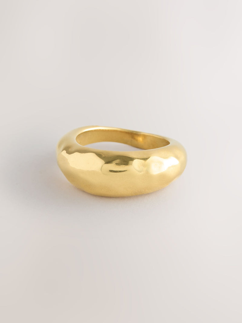 Gold tone stainless steel waterproof domed ring, imported from the UK