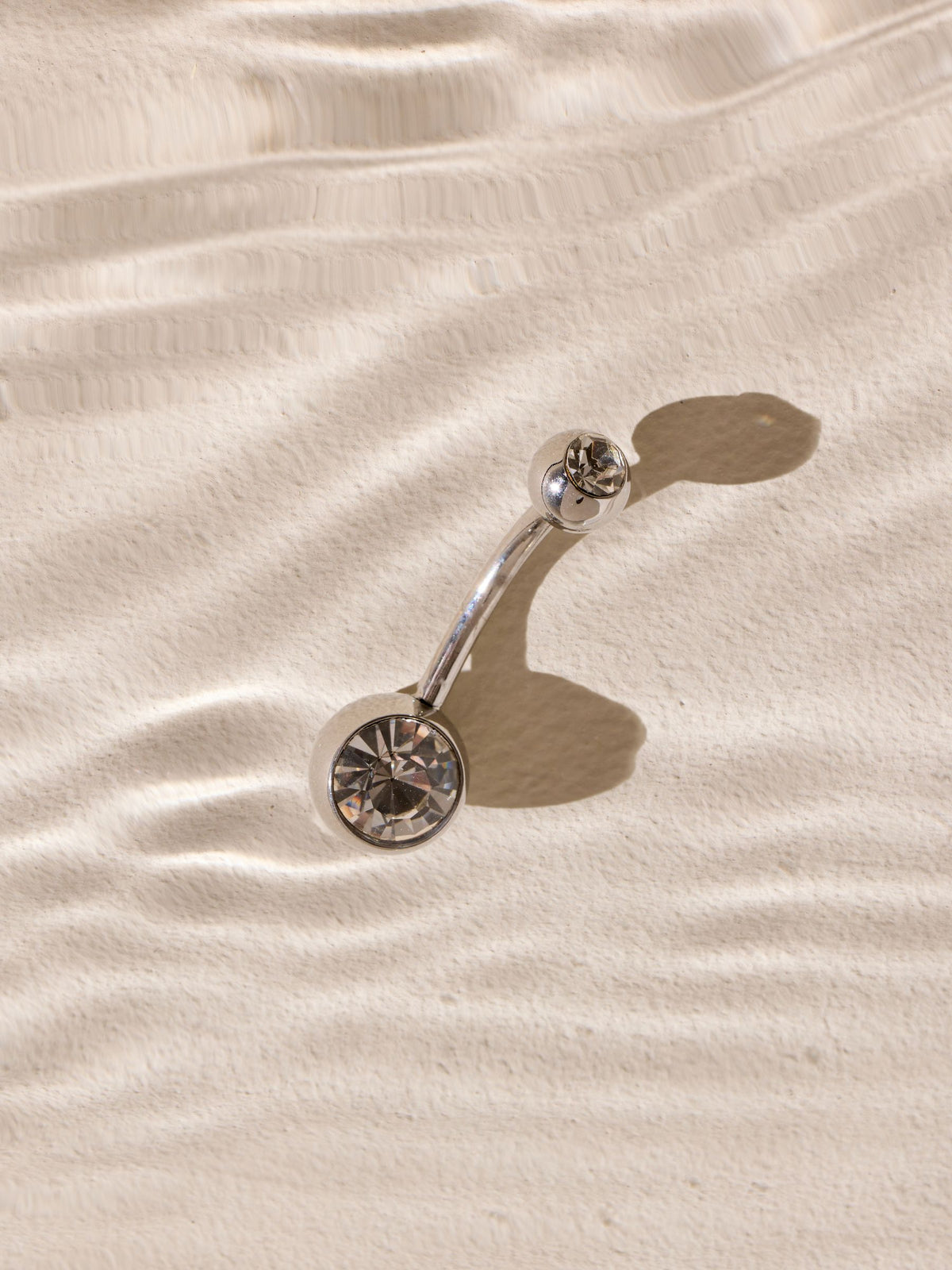 Silver tone belly bar with sparkle stainless steel, UK version