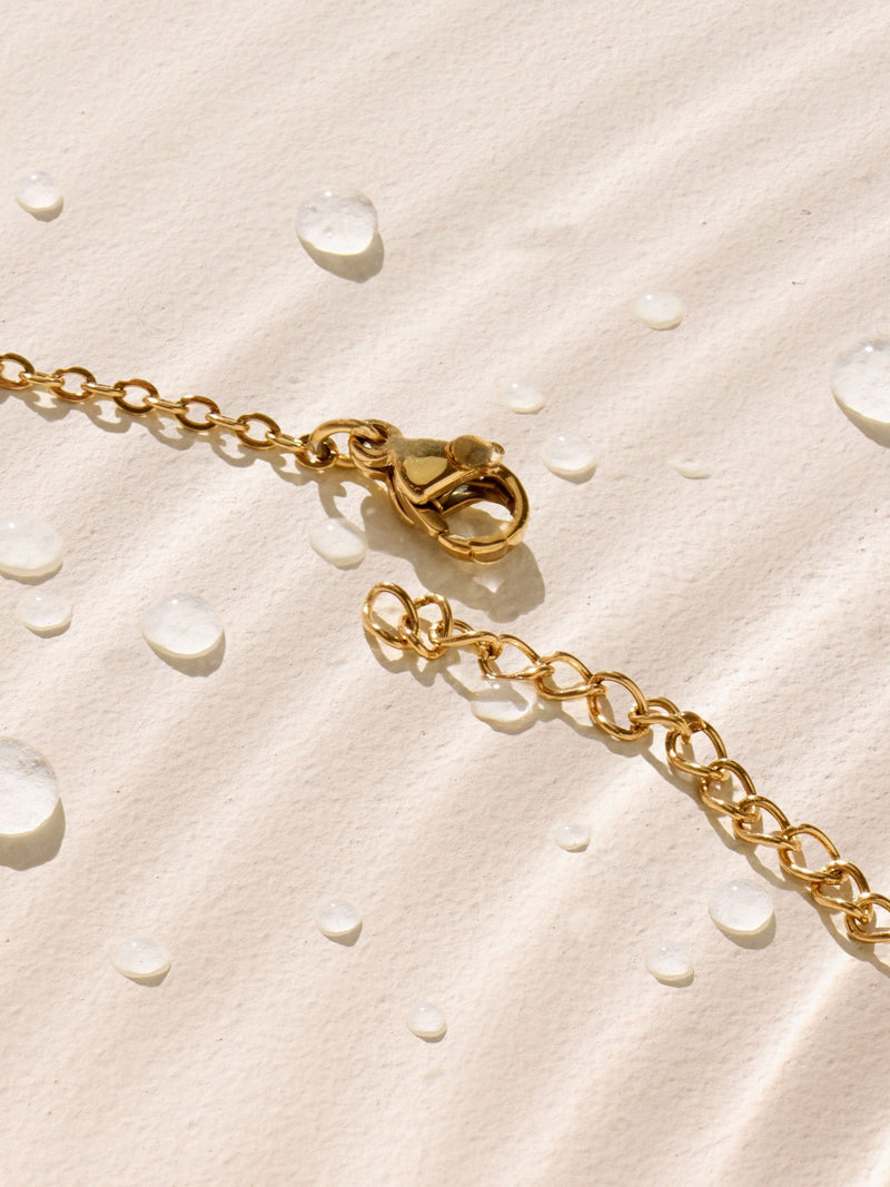 Gold tone waterproof stainless steel pebble necklace, UK version