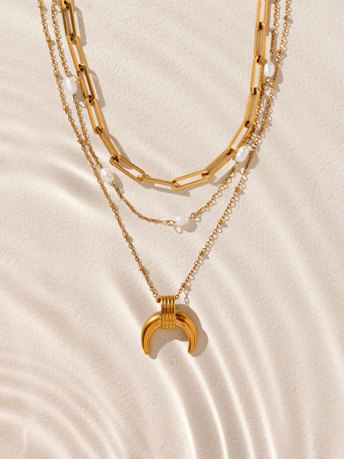 Gold tone stainless steel three-layer pendant necklace with real pearl (British brand)
