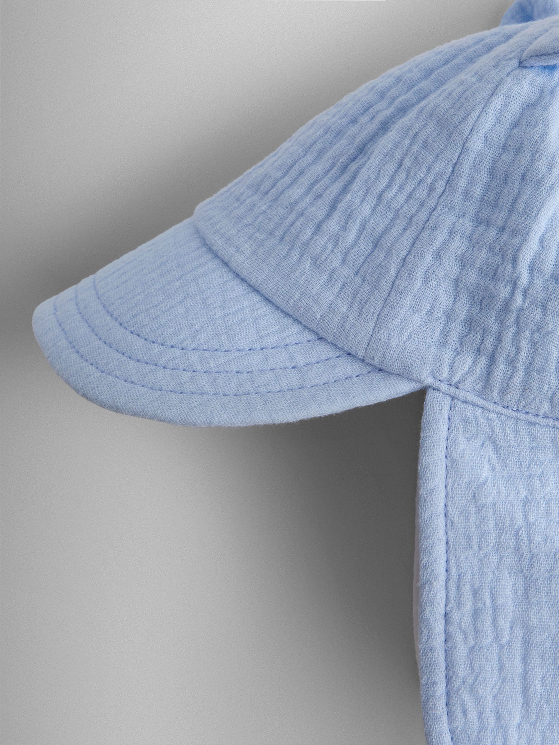JoJo Maman Bébé blue cheesecloth legionnaire cap, imported from the UK