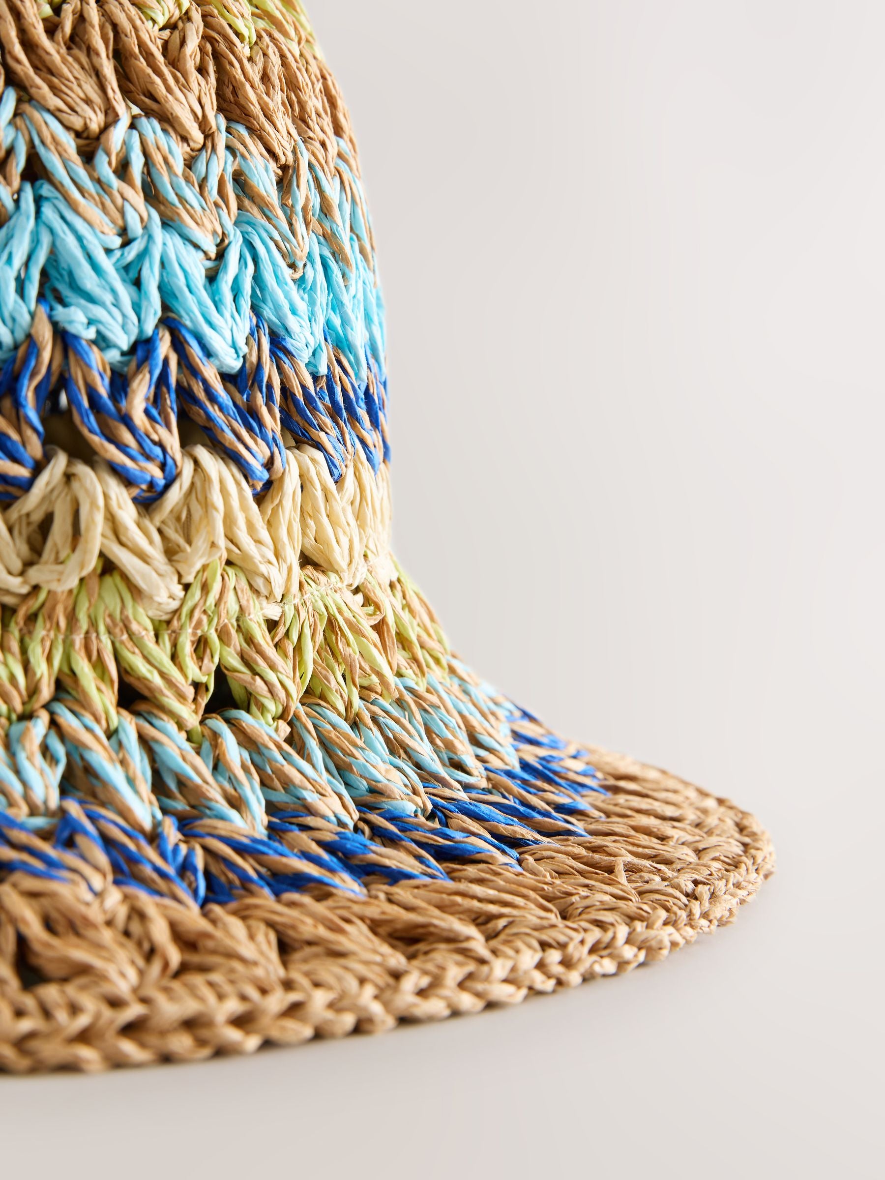 Woven bucket hat in bright blue stripe, UK version
