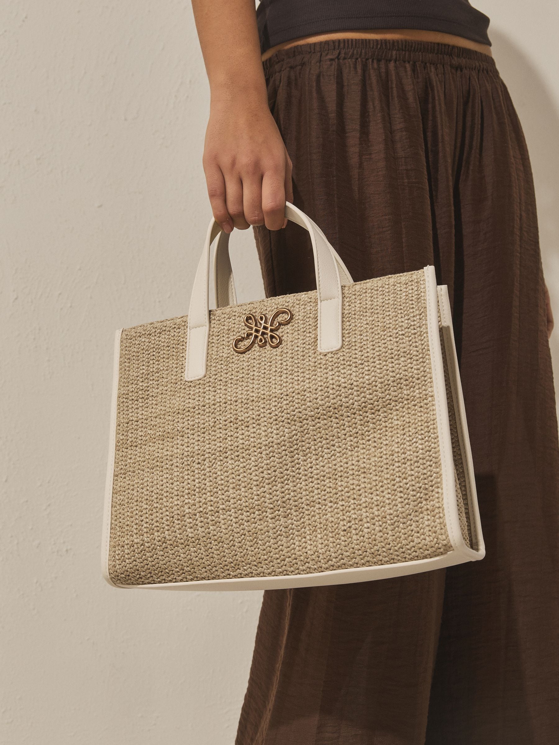 Raffia effect shoulder bag with recycled polyester lining (British brand)